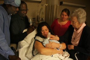 Baptized Priest Prophet King Sr. Mary Margaret baptizes Xavi Jean "Priest, Prophet, King!"