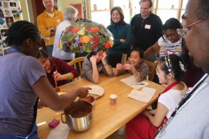 Taking at a turn at frosting the cake...