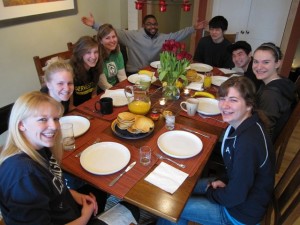 Breaking bread with Northside neighbor and Peace Foundation volunteer, Kenny Scales