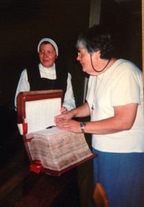 S. Suzanne signing the Vow Book of the Monastery of Annecy, France in June, 2009 during the 400th Anniversary Pilgrimage. 