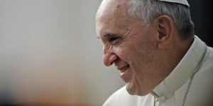 Pope Francis smiles during the weekly general audience in St. Peter's Square, at the Vatican, Wednesday, Oct. 9, 2013. (AP Photo/Gregorio Borgia)